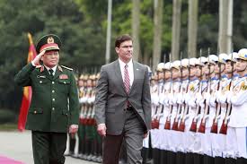 Kết quả hình ảnh cho U.S. Defense Secretary Mark Esper, center, and Vietnamese Defense Minister Ngo Xuan Lich review an honor guard in Hanoi, Vietnam, Nov. 20, 2019.