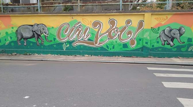 Murals on the wall of the old cemetery