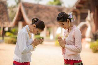 Two Thai women in Sawasdee action.
